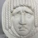 Masque de style visage en bas-relief antique