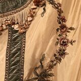 Bedspread converted into silk door with rich decorations embroidered in cinnamon, nineteenth