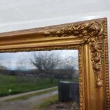 Wood mirror and golden Stuk