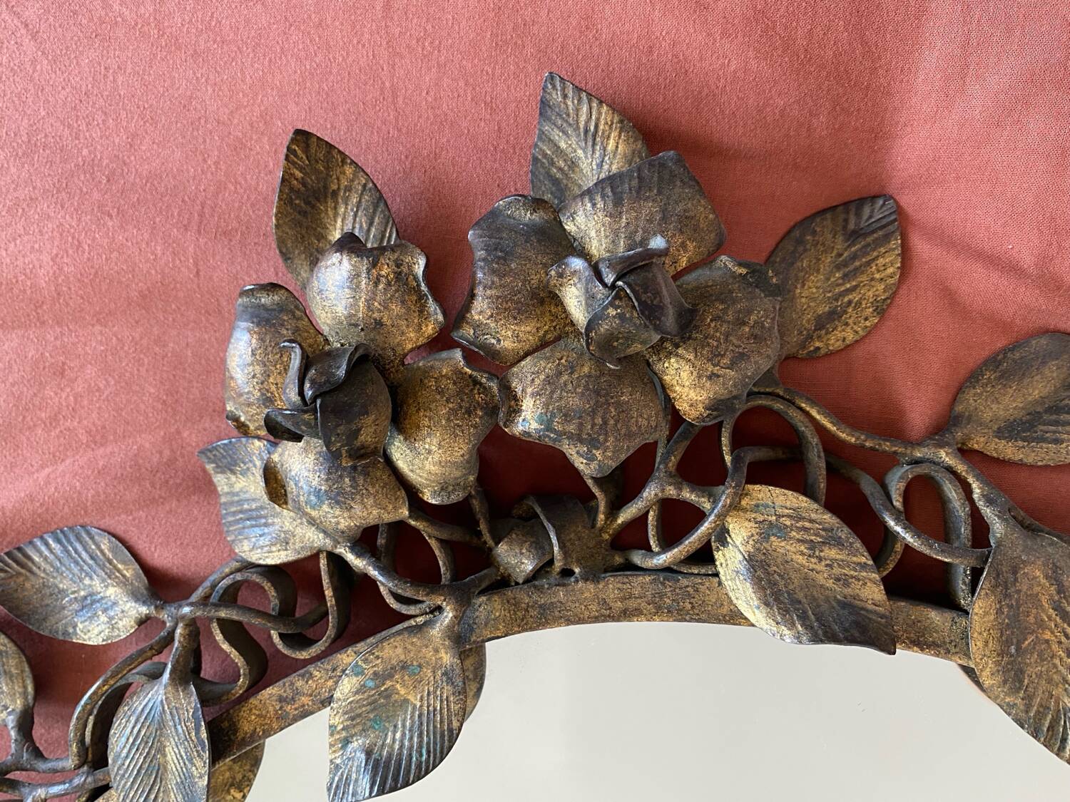Old bronze frame mirror