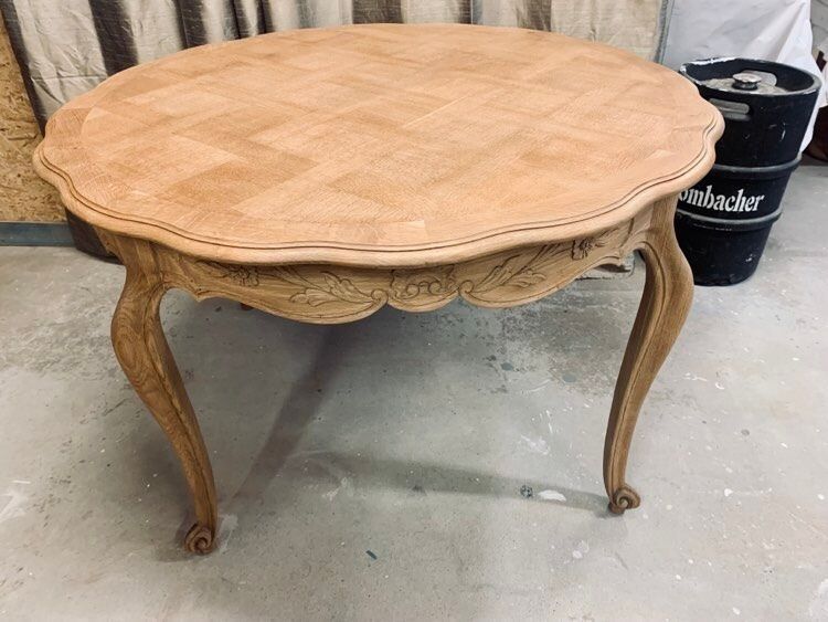 Round solid oak dining table