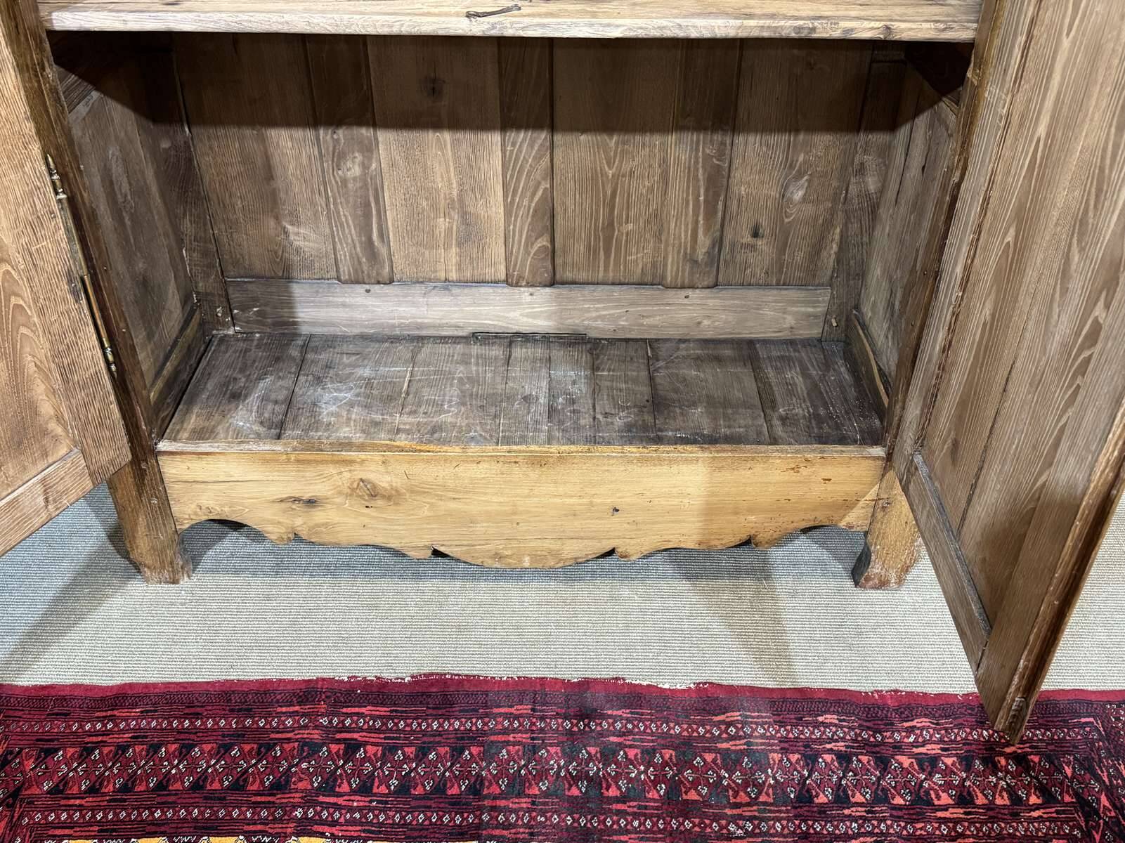 19th-century country wardrobe in blonde chestnut.