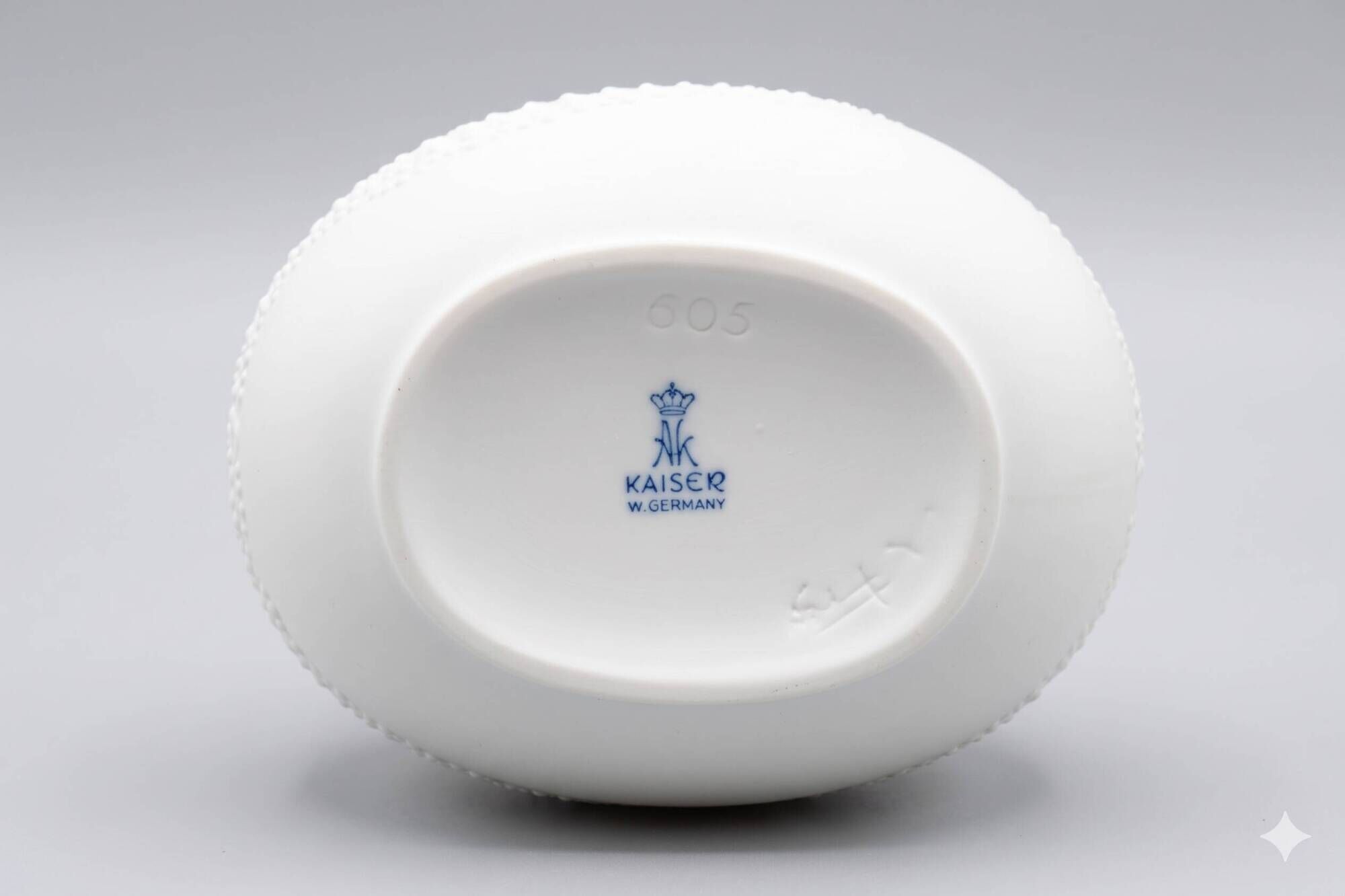 Biscuit porcelain vase by Kaiser, relief decoration, op art design.