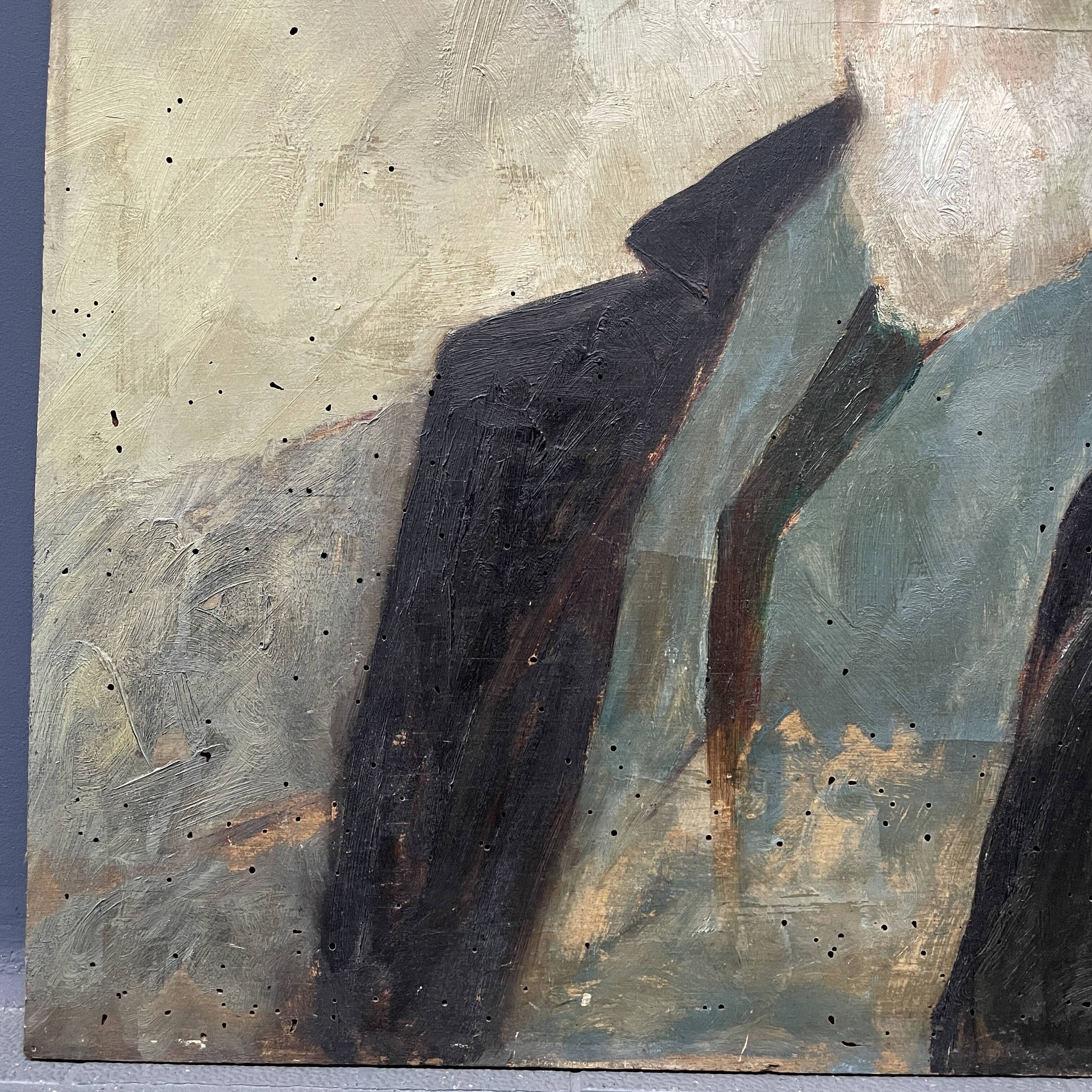 Old portrait of man painted on wooden panel