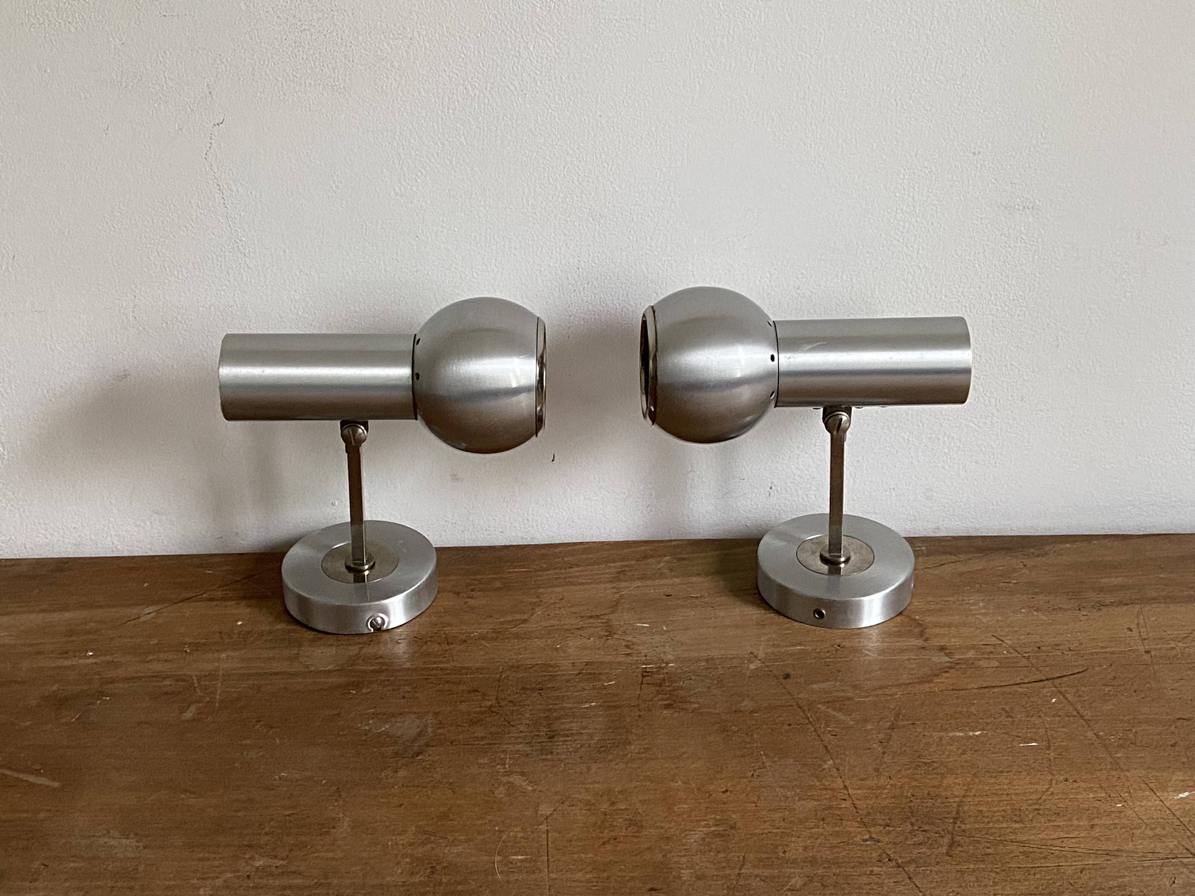 Pair of Eye Ball wall lights. 1970. Brushed stainless steel.