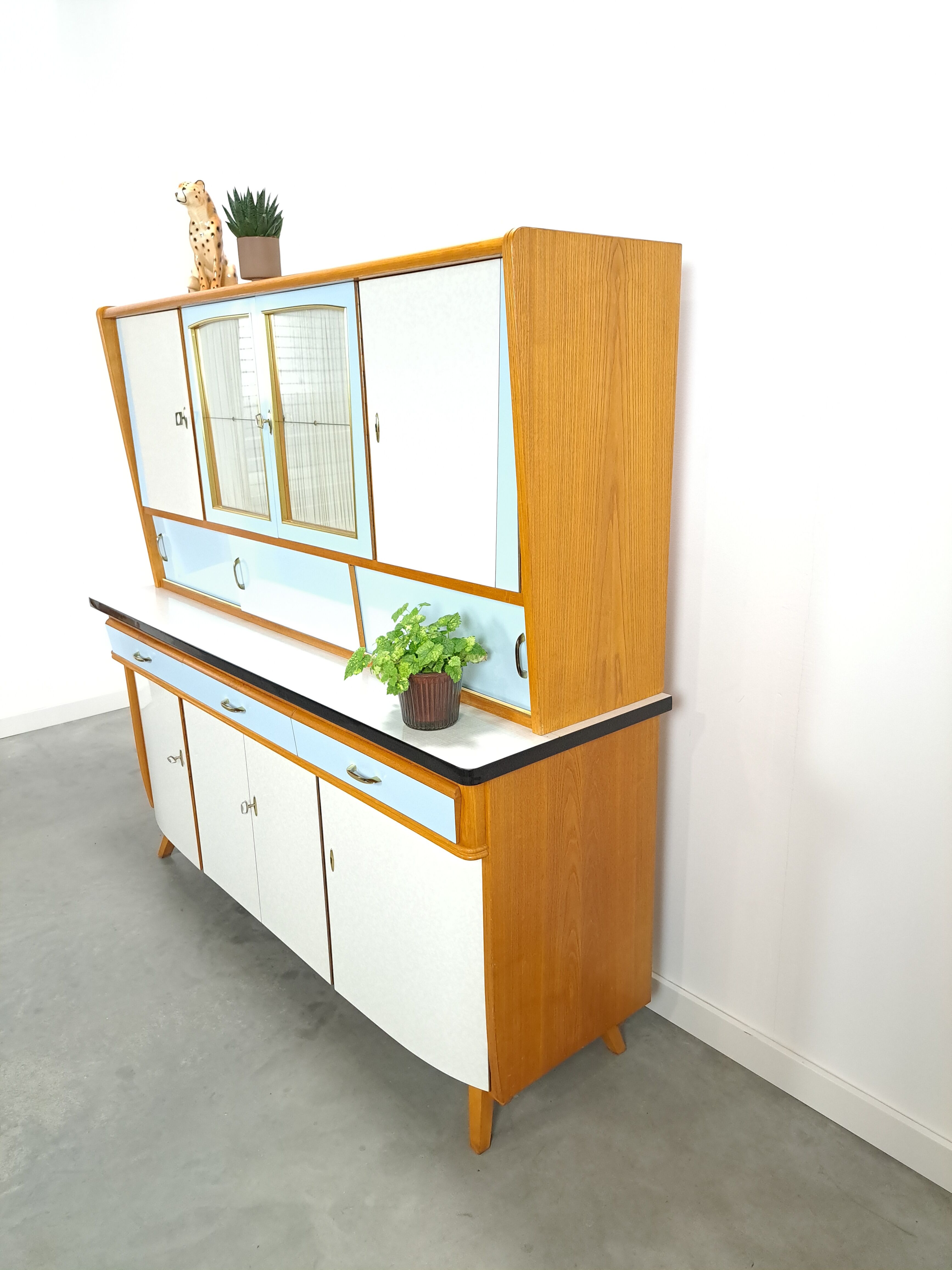 50s vintage kitchen cabinet with brass and formica