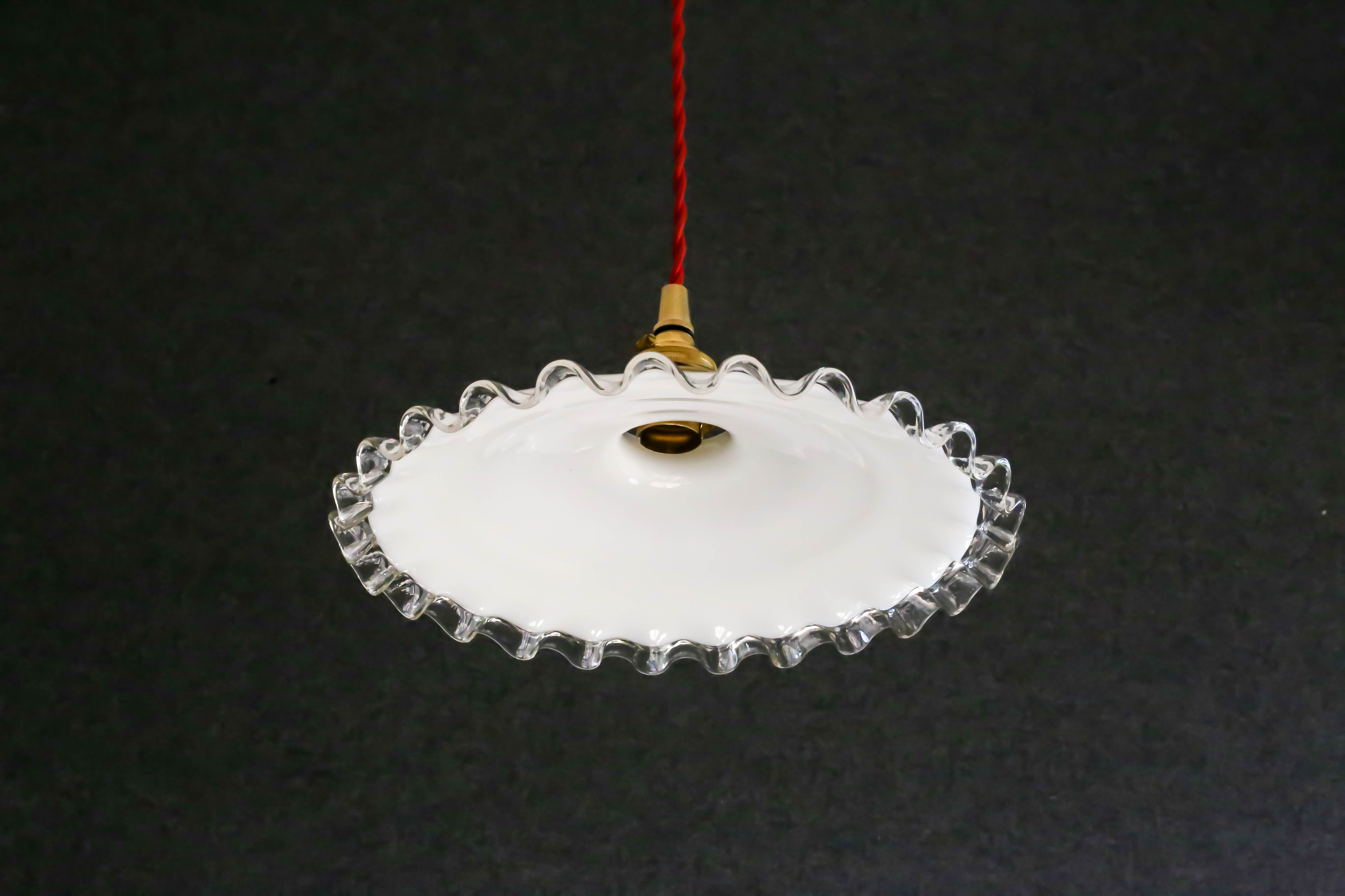 White opaline pendant light with crenellated edges