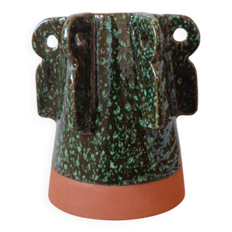 Sculptural ceramic vase with dark green glaze and reflections