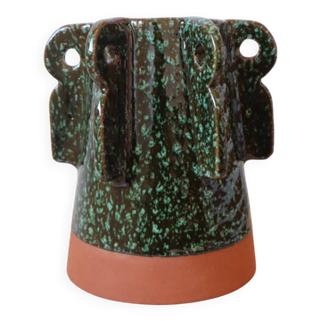 Sculptural ceramic vase with dark green glaze and shimmering highlights
