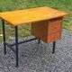 Vintage oak desk with a metallic base from the 1960s.