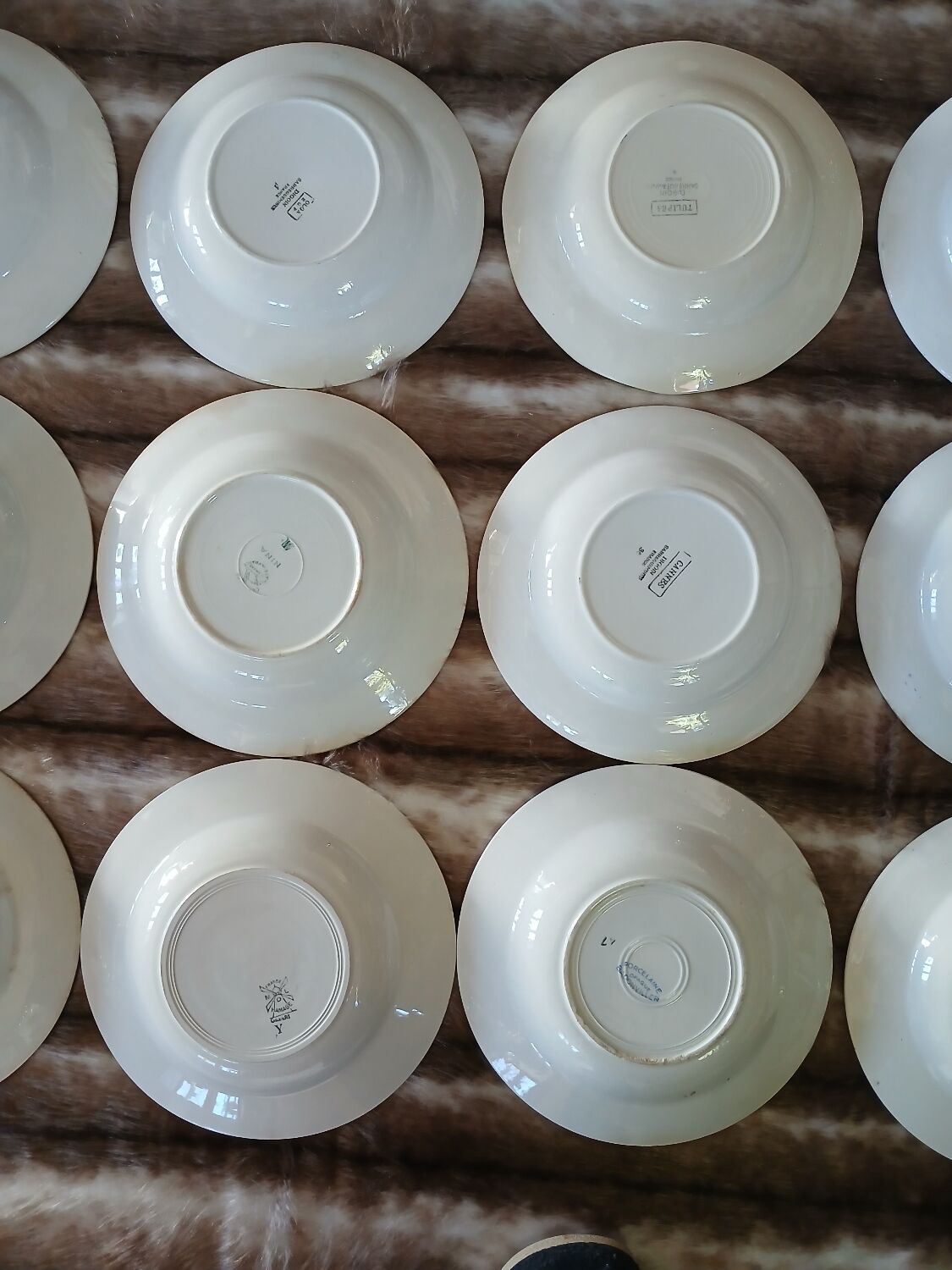 16 mismatched antique deep plates