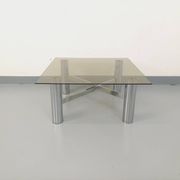Square Italian vintage Space Age coffee table in smoked glass and metal.