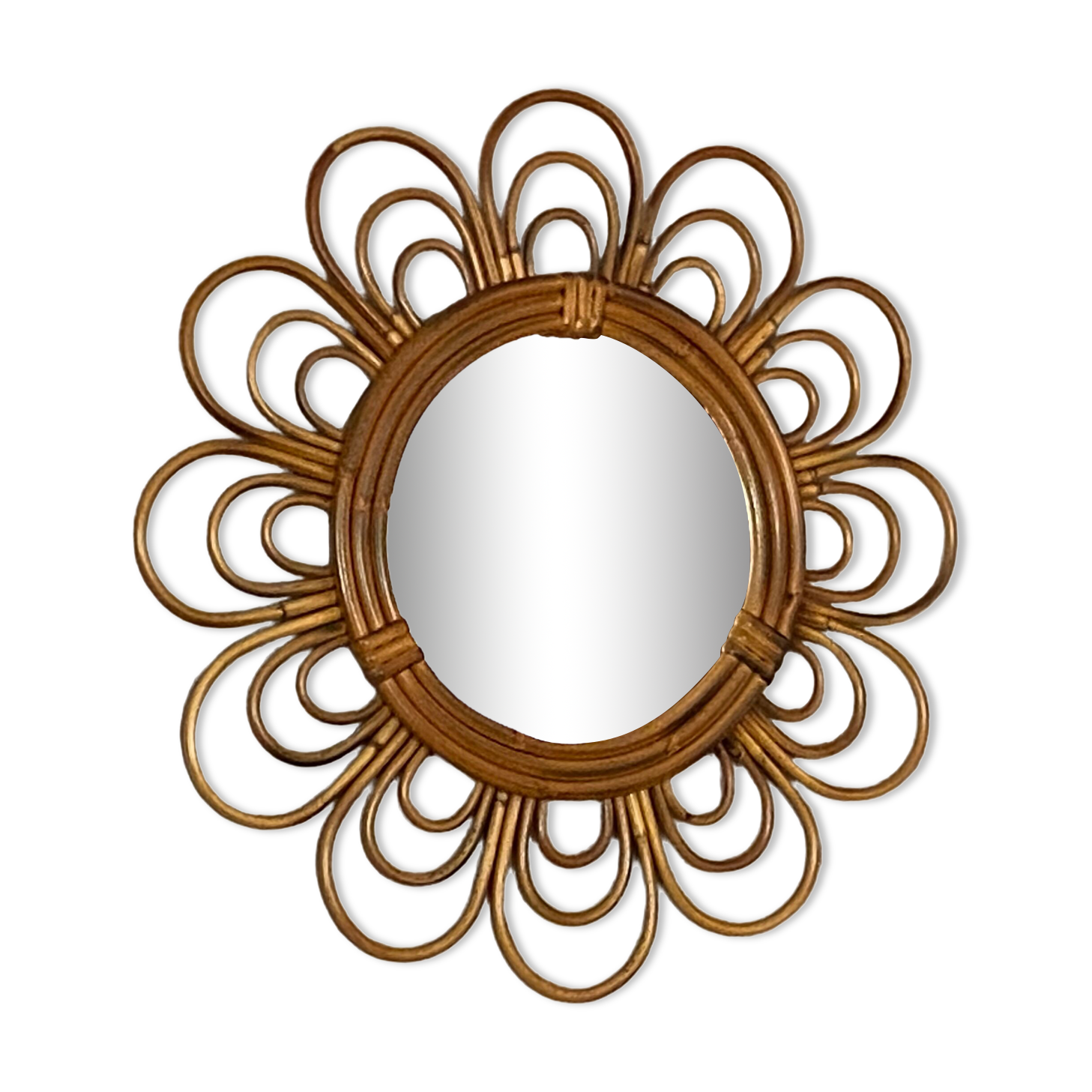 Sun mirror in arched rattan. 40cm. 1960.