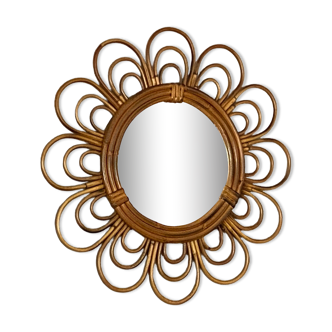 Sun mirror in arched rattan. 40cm. 1960.