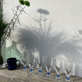 6 clear champagne flutes with blue stems, designer style