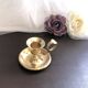 Hand candle holder called "Cave Rat" vintage golden brass