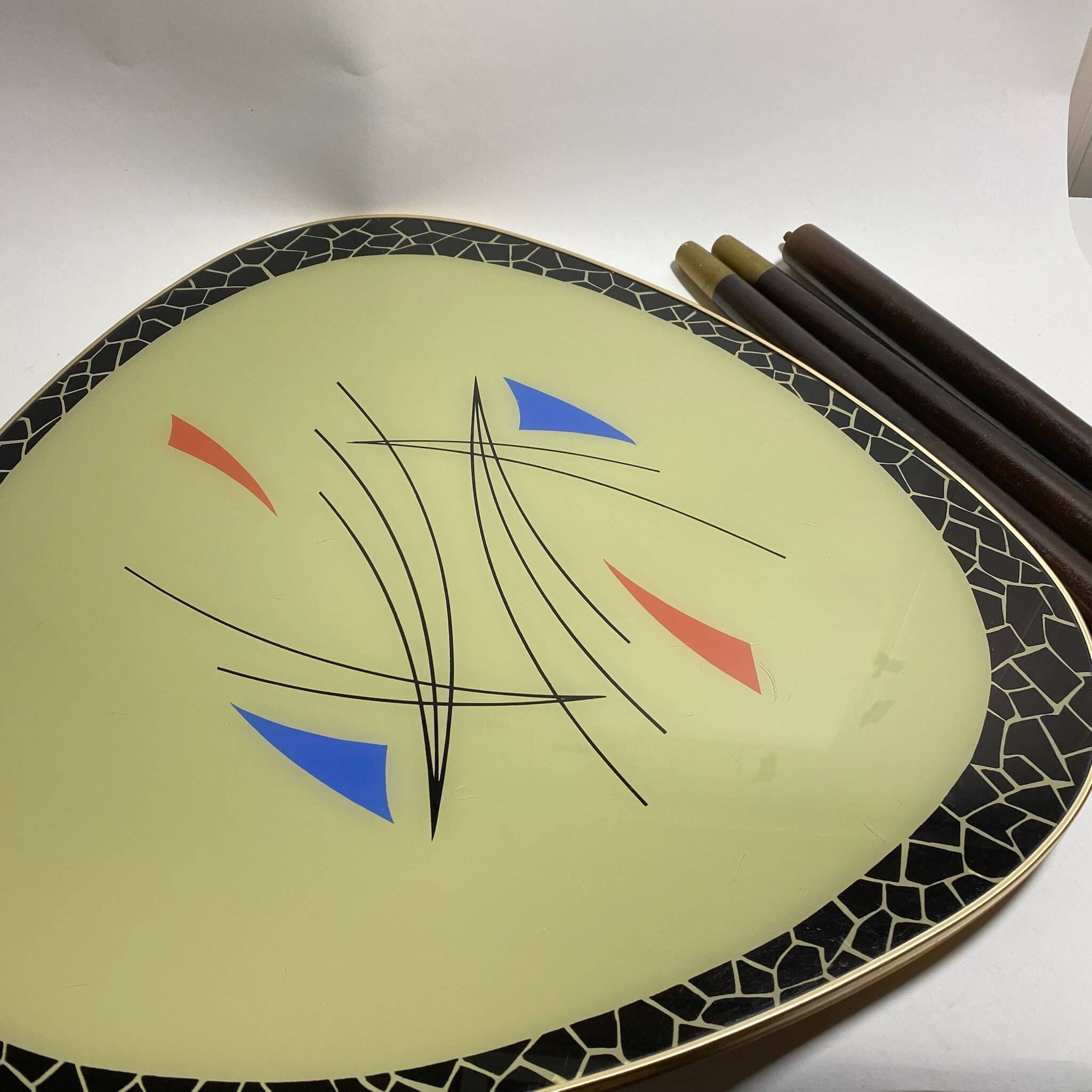 Triangular coffee table with vintage glass top