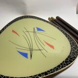 Triangular coffee table with vintage glass top