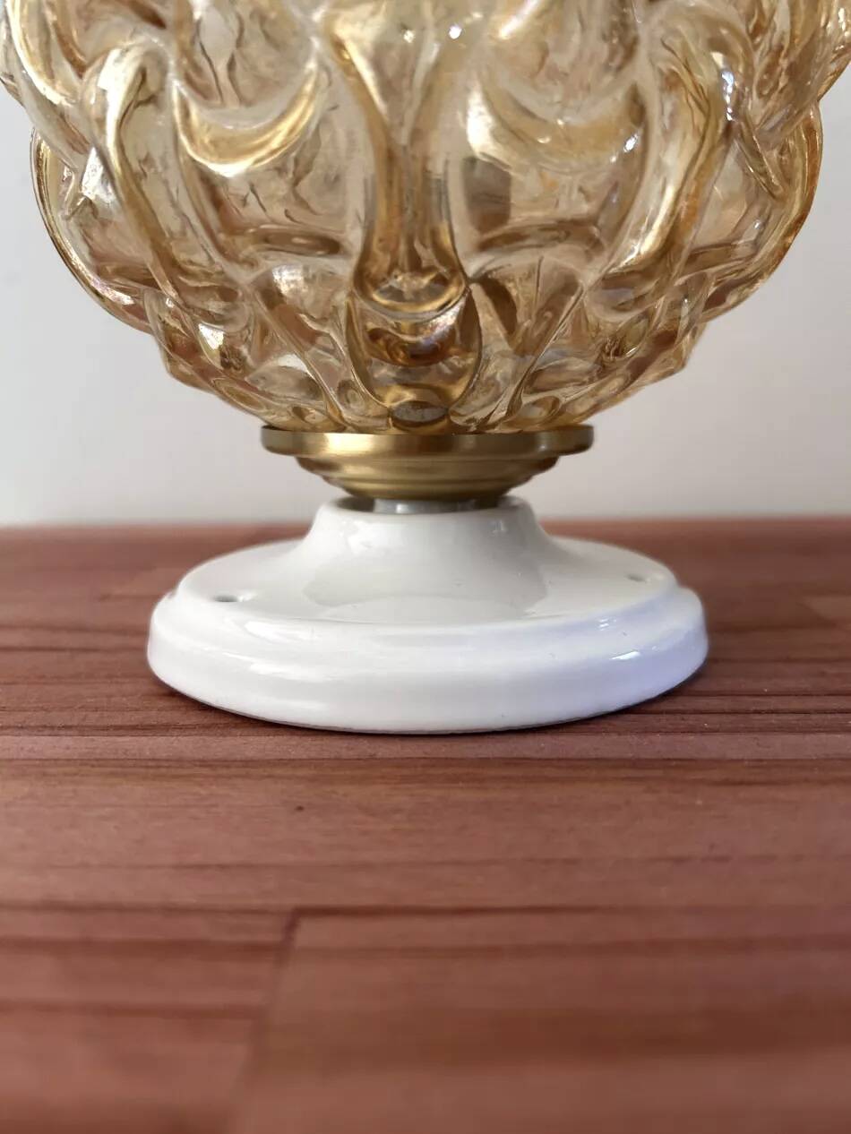 Pair of gold glass globe wall lights