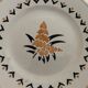 7 dessert plates and one Longwy dish