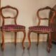 Pair of Rococo style chairs — Feminine & elegant, reupholstered in the antique style.