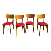 Set of 4 vintage bistro chairs in wood and red faux leather, with splayed legs.