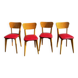 Set of 4 vintage bistro chairs in wood and red faux leather, with splayed legs.