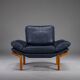 Danish teak and navy blue leather lounge chair from Komfort, 1970s