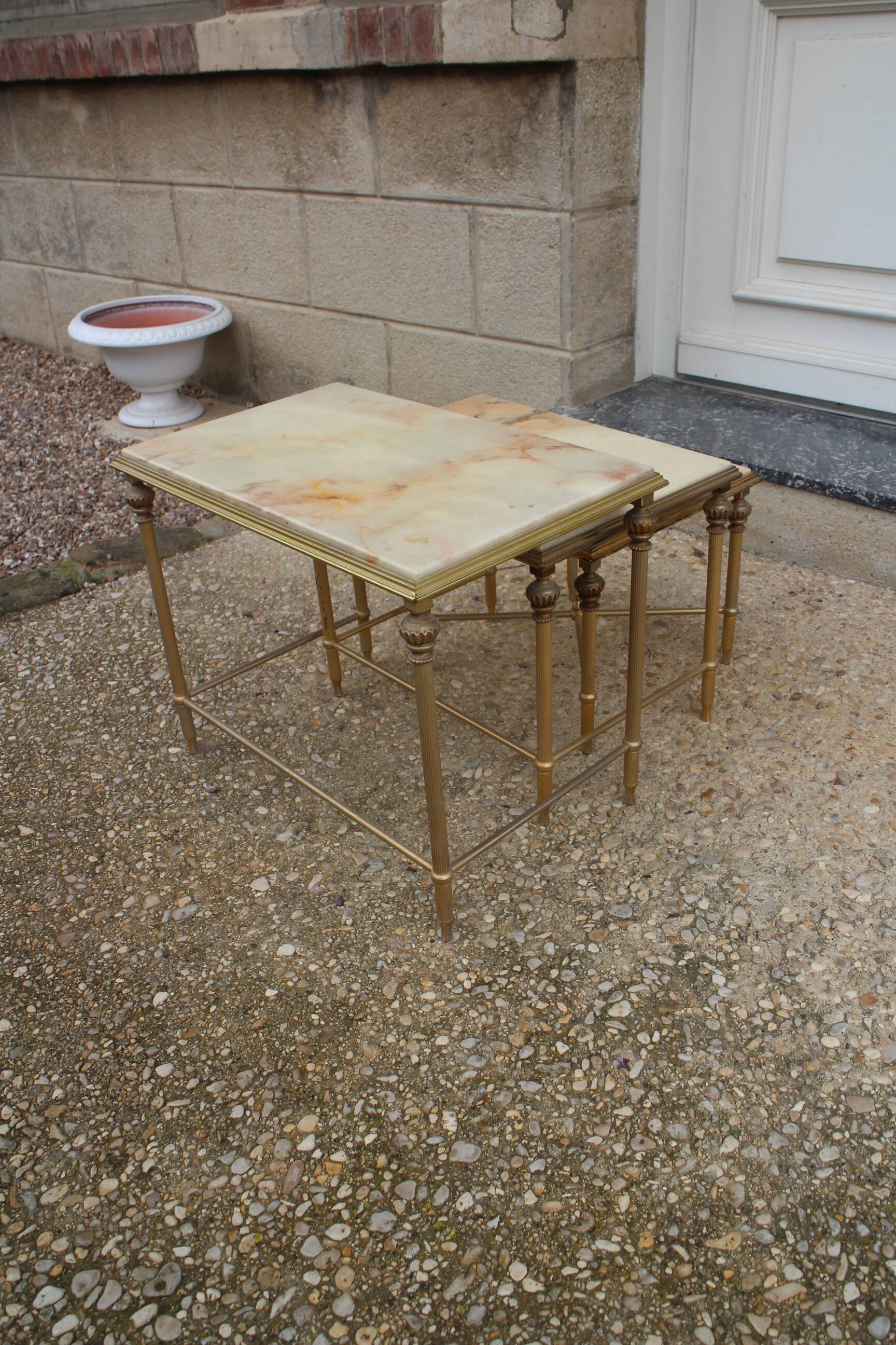 brass and onyx nesting table