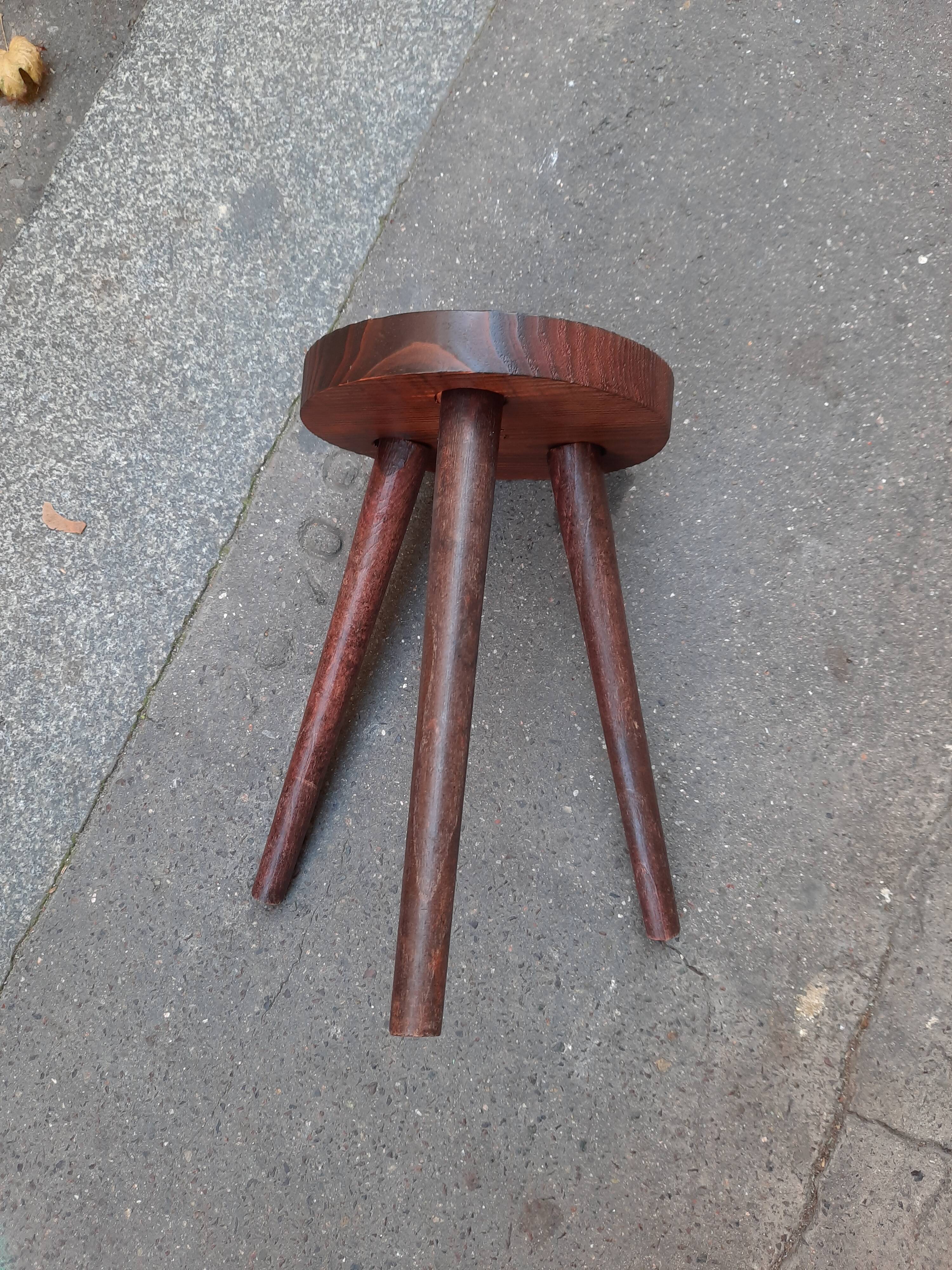 Wooden tripod stool