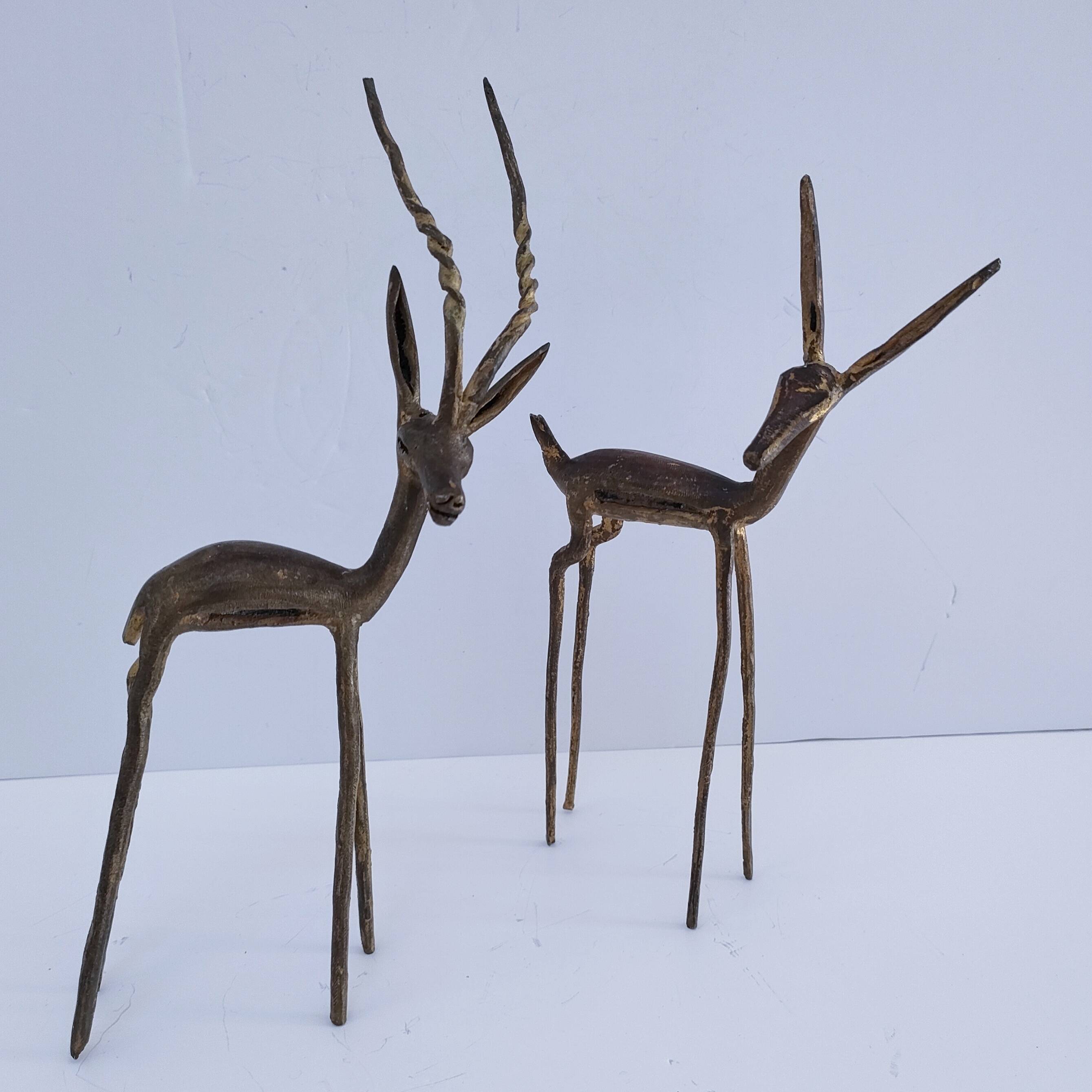 four vintage brass gazelle antelope sculptures