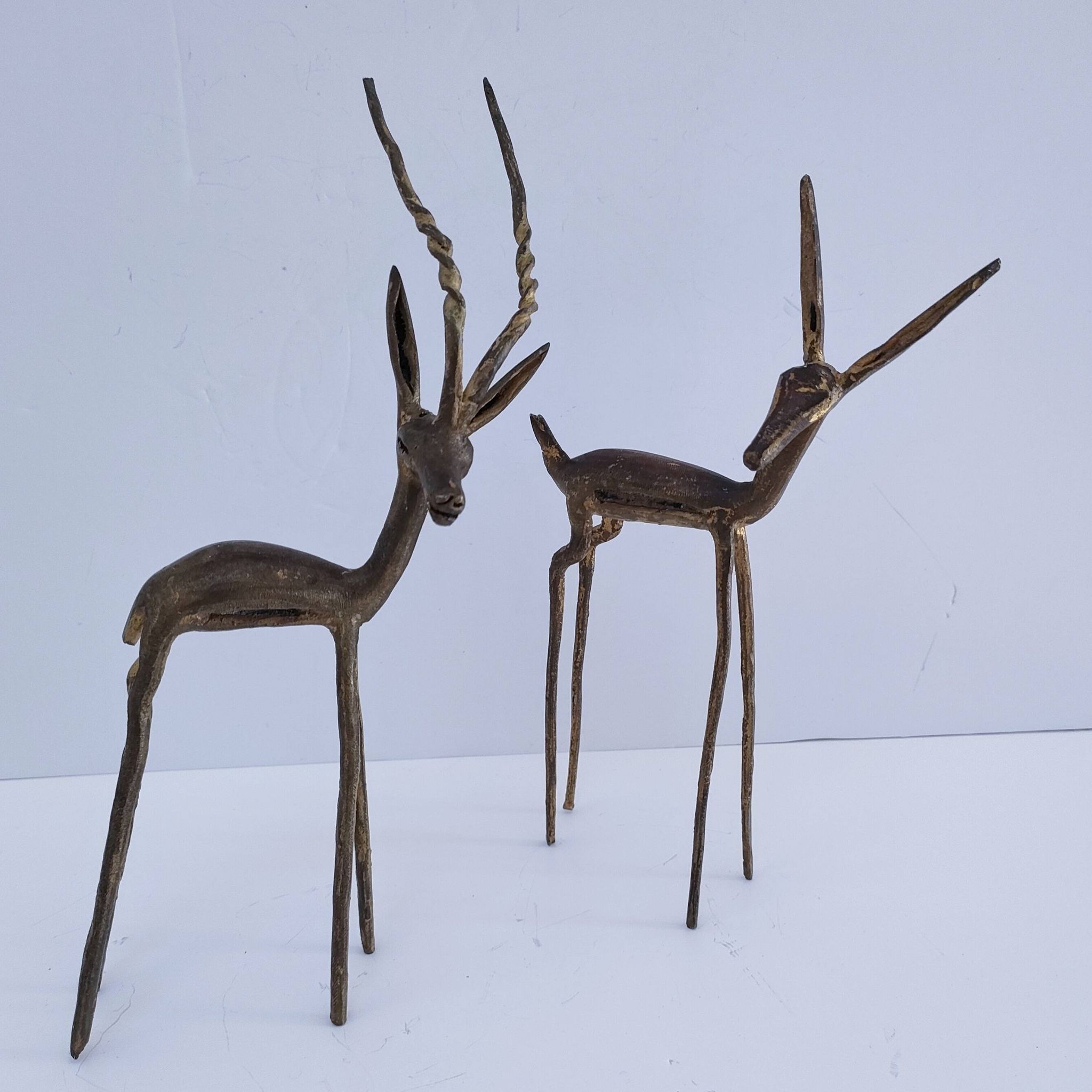 four vintage brass gazelle antelope sculptures