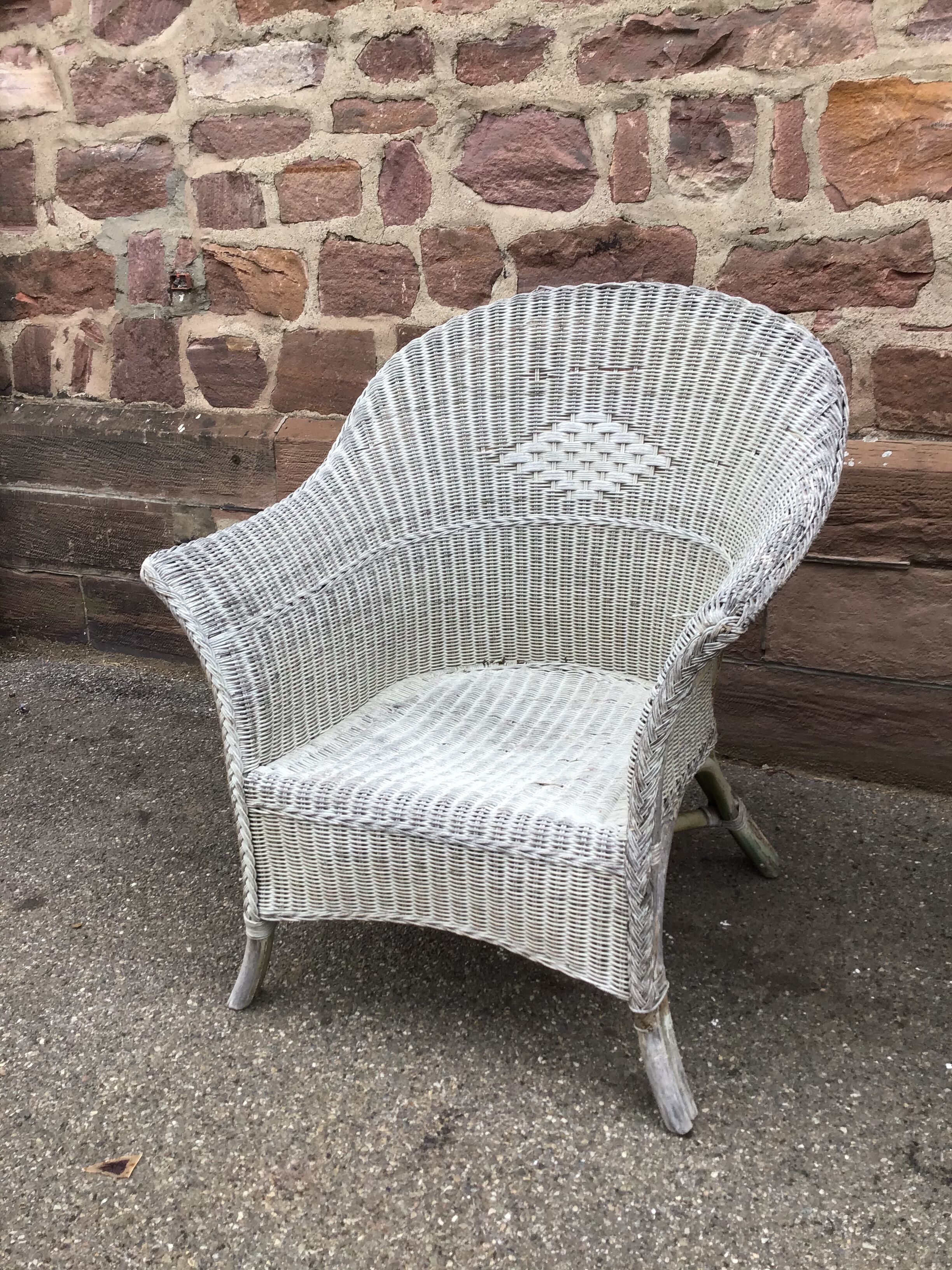2 vintage grey rattan armchairs from the 60s