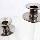 Pair of lucite and silver-plated metal candlesticks