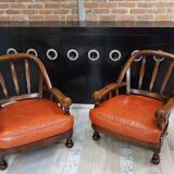 Pair of 60s armchairs in leather and wood