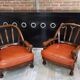 Pair of 60s armchairs in leather and wood