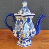 Cobalt blue teapot with flower pattern. Hexagonal teapot