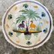Old dish camels and palm trees restored