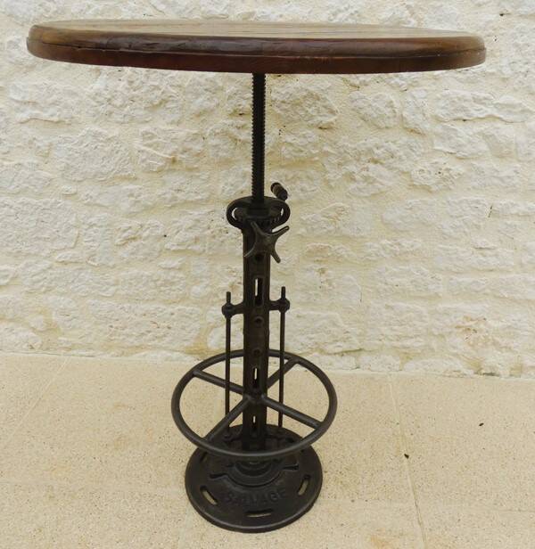 Unique bistro table with its adjustable industrial cast iron leg