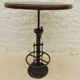 Unique bistro table with its adjustable industrial cast iron leg