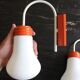 Ancienne paire d'appliques design 70 orange forme d'ampoule vintage