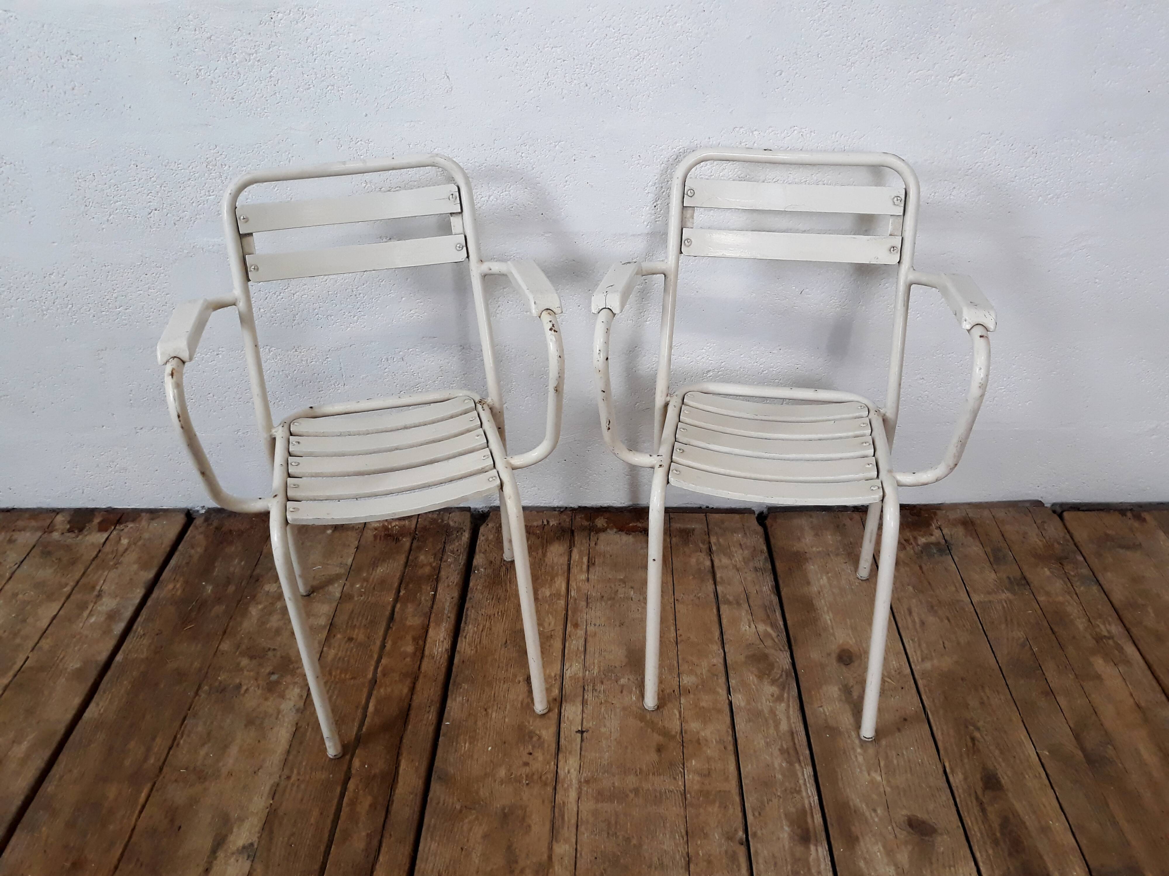 4 chairs and armchairs by Tolix