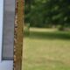 Large bevelled khaki mirror in mother-of-pearl from the 70s/80s.