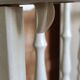 White-bar baby cot