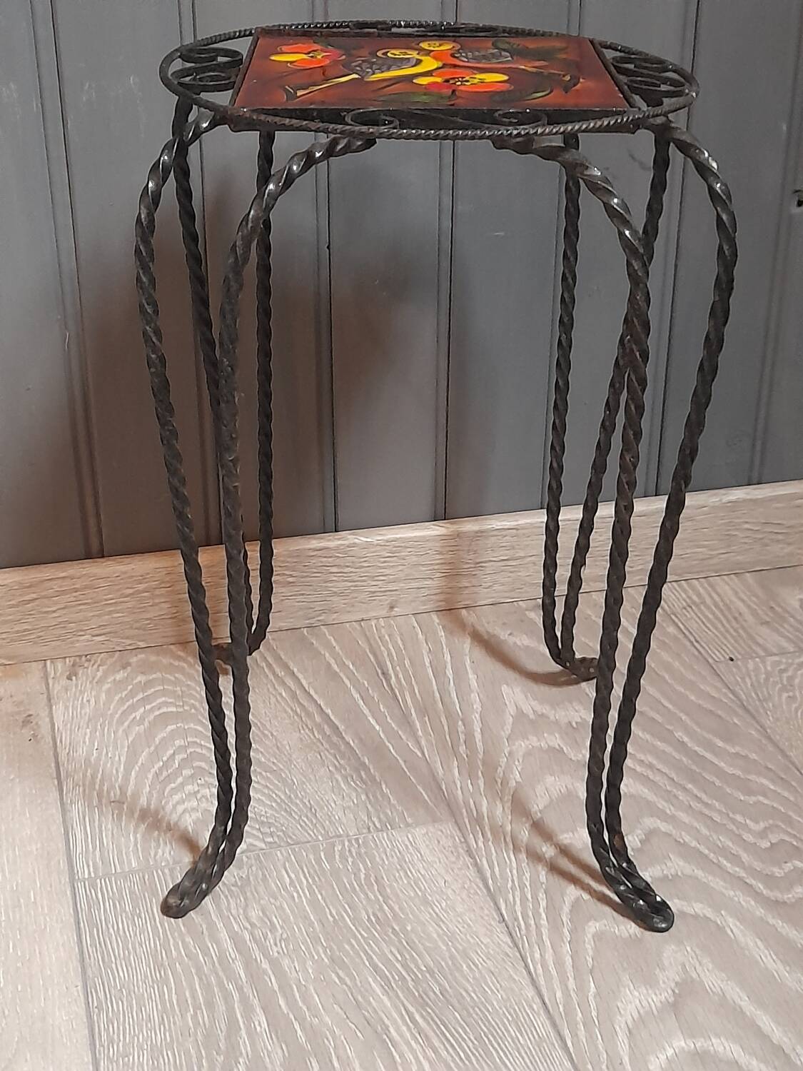 Wrought iron stool and Vallauris pottery signed Leduc.