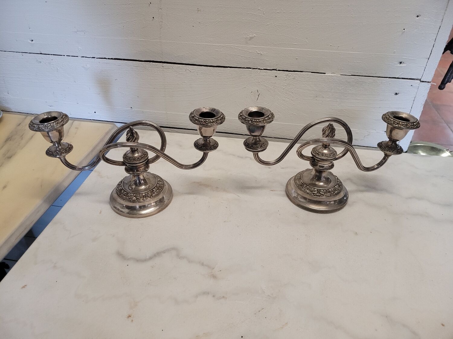 Pair of silver metal candlesticks