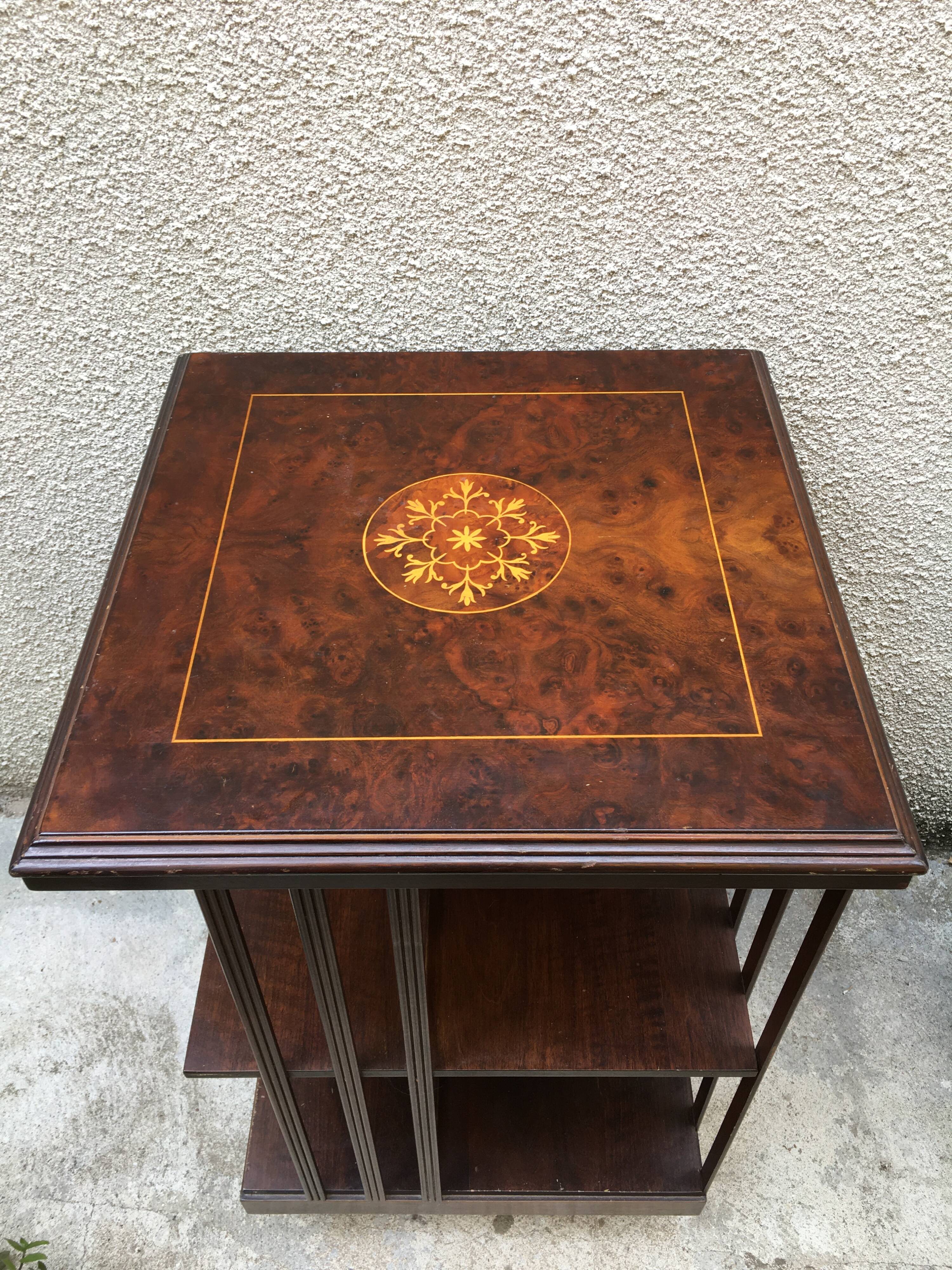 Revolving english library in mahogany, wheeled footing