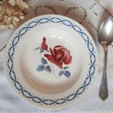 Mismatched old soup plates accompanied by a soup tureen