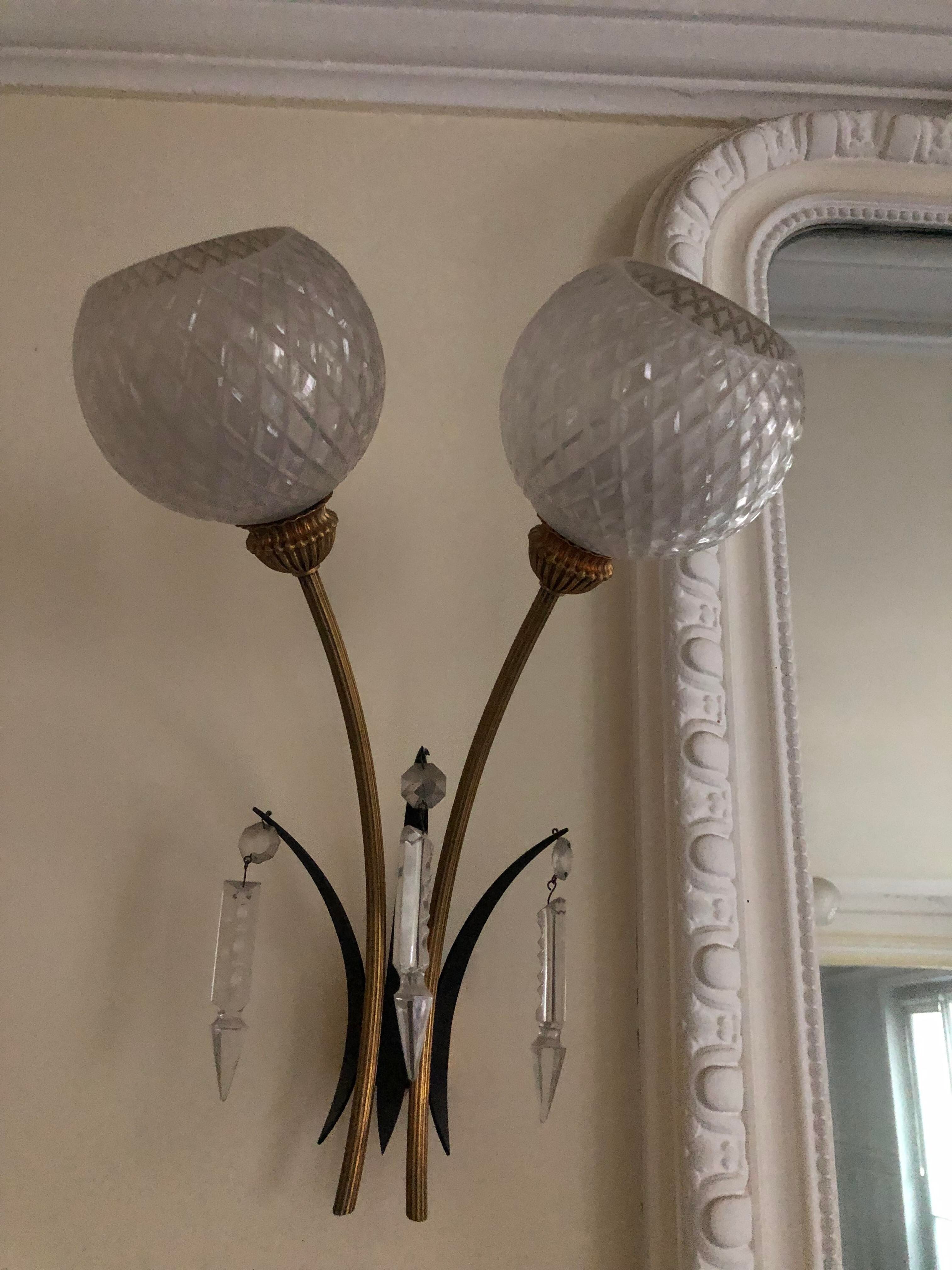 Paire d'appliques en bois doré