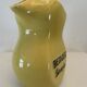 Old yellow pitcher anisette berger syrups, vintage bistro decoration